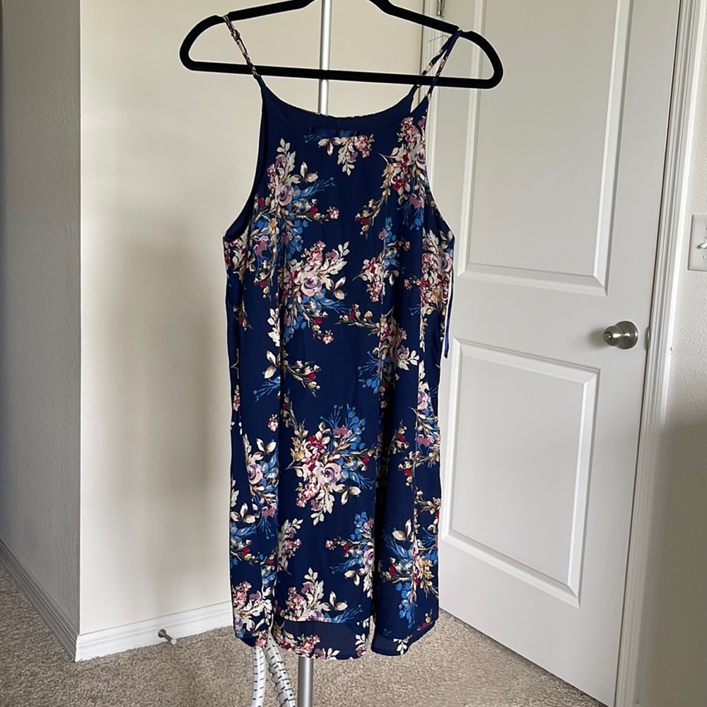 Floral dress from Franchesca’s. Brand is Blue Rain.